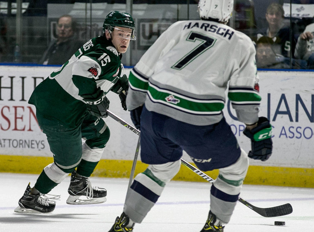 Everett’s Sean Richards eyes Seattle’s Reece Harsch on Friday at ShoWare Center in Kent. (Kevin Clark / The Herald)
