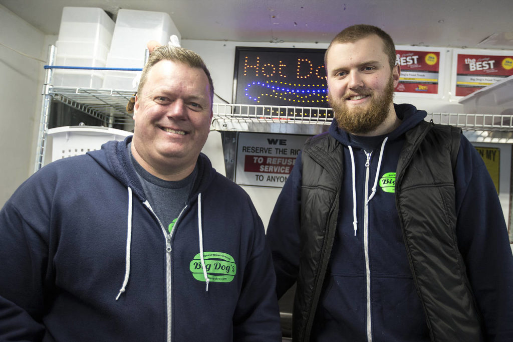 Jerry and Jake Dixon enjoy working together on the truck. (Ian Terry / The Herald)
