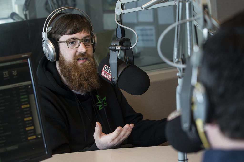 PRC marijuana retail manager Thomas Fallihee discusses the marijuana industry from a business perspective during a recording of an episode of the “In the Weeds” podcast at the KRKO/KXA radio station offices in downtown Everett. (Ian Terry / The Herald) 
