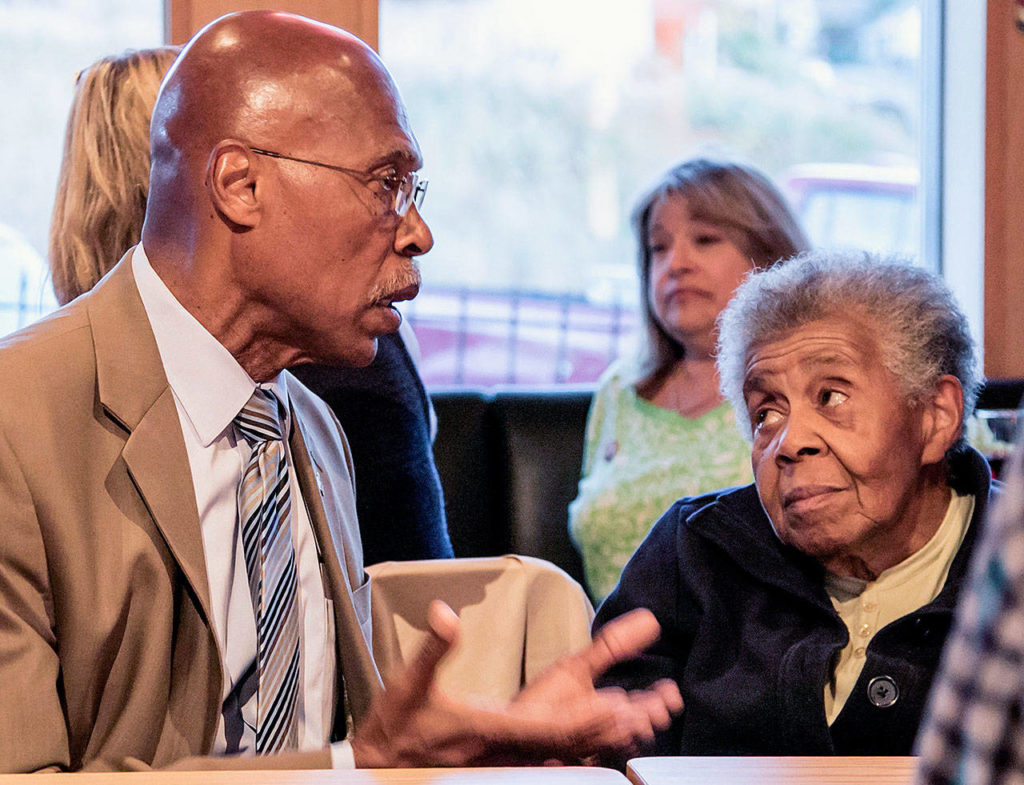 John Lovick, then Snohomish County executive and now a state lawmaker, talks with Marian Harrison as election results trickle in on Aug. 8, 2015, at the Anchor Pub in Everett. Lovick and Harrison reflected this week on the assassination of Dr. Martin Luther King Jr. 50 years ago. (Kevin Clark / Herald file)
