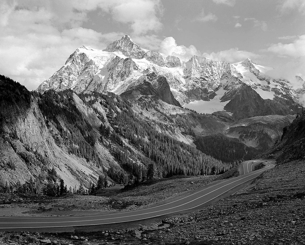 This black-and-white photo of Mount Shuksan is one of 45 by Norman Riley on display at the Everett Community College’s Russell Day Gallery.