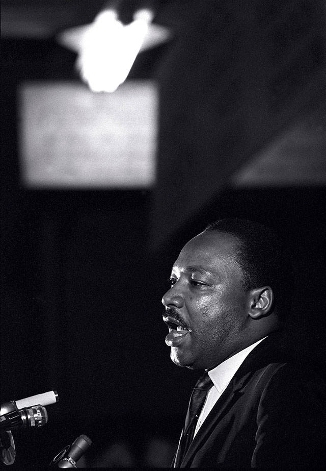 Dr. Martin Luther King Jr. makes his last public appearance at the Mason Temple in Memphis, Tenn., on April 3, 1968. King was assassinated the next day on his motel balcony. (Charles Kelly/Associated Press file photo)