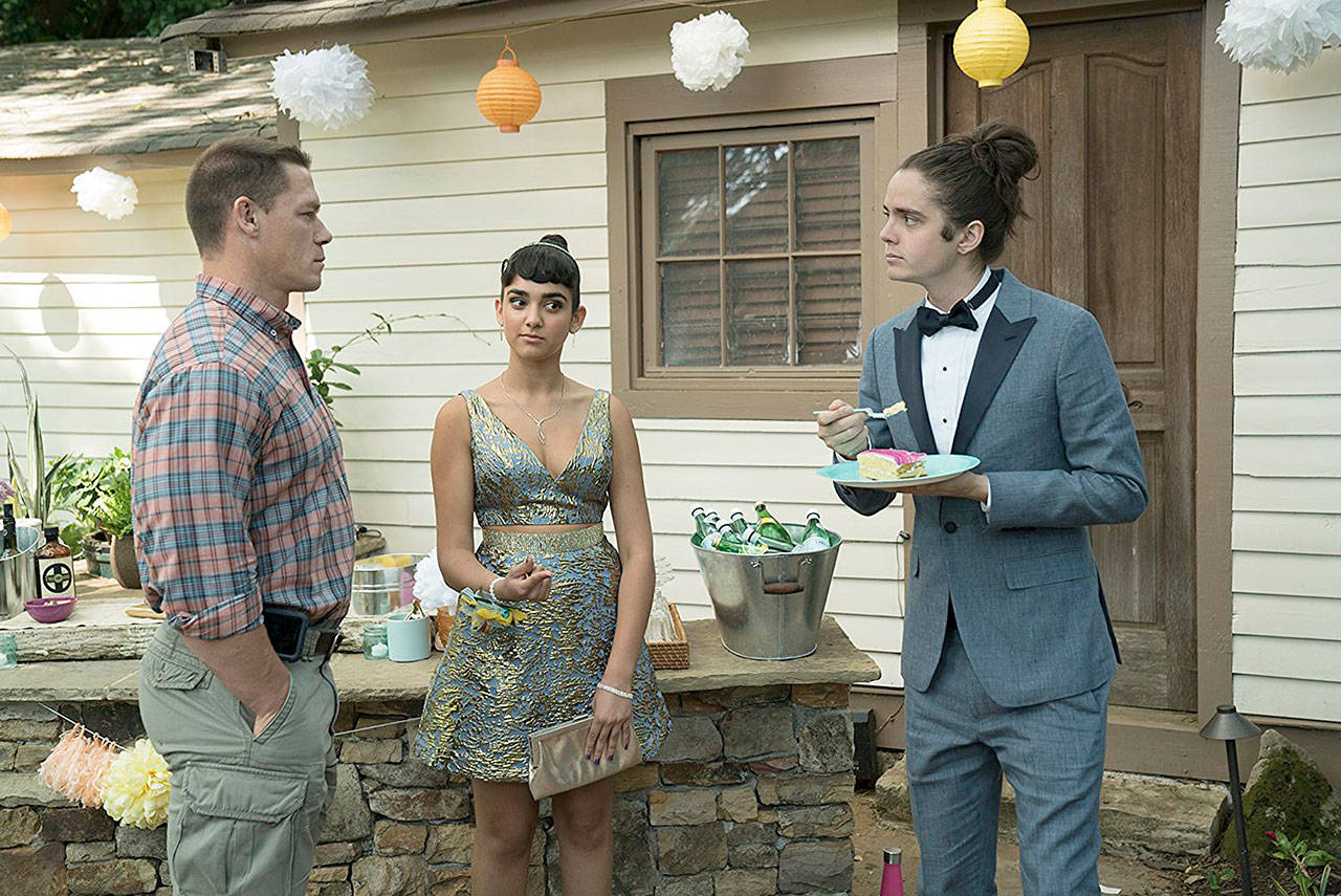 From left, John Cena, Geraldine Viswanathan and Miles Robbins in “Blockers.” (Universal Pictures)