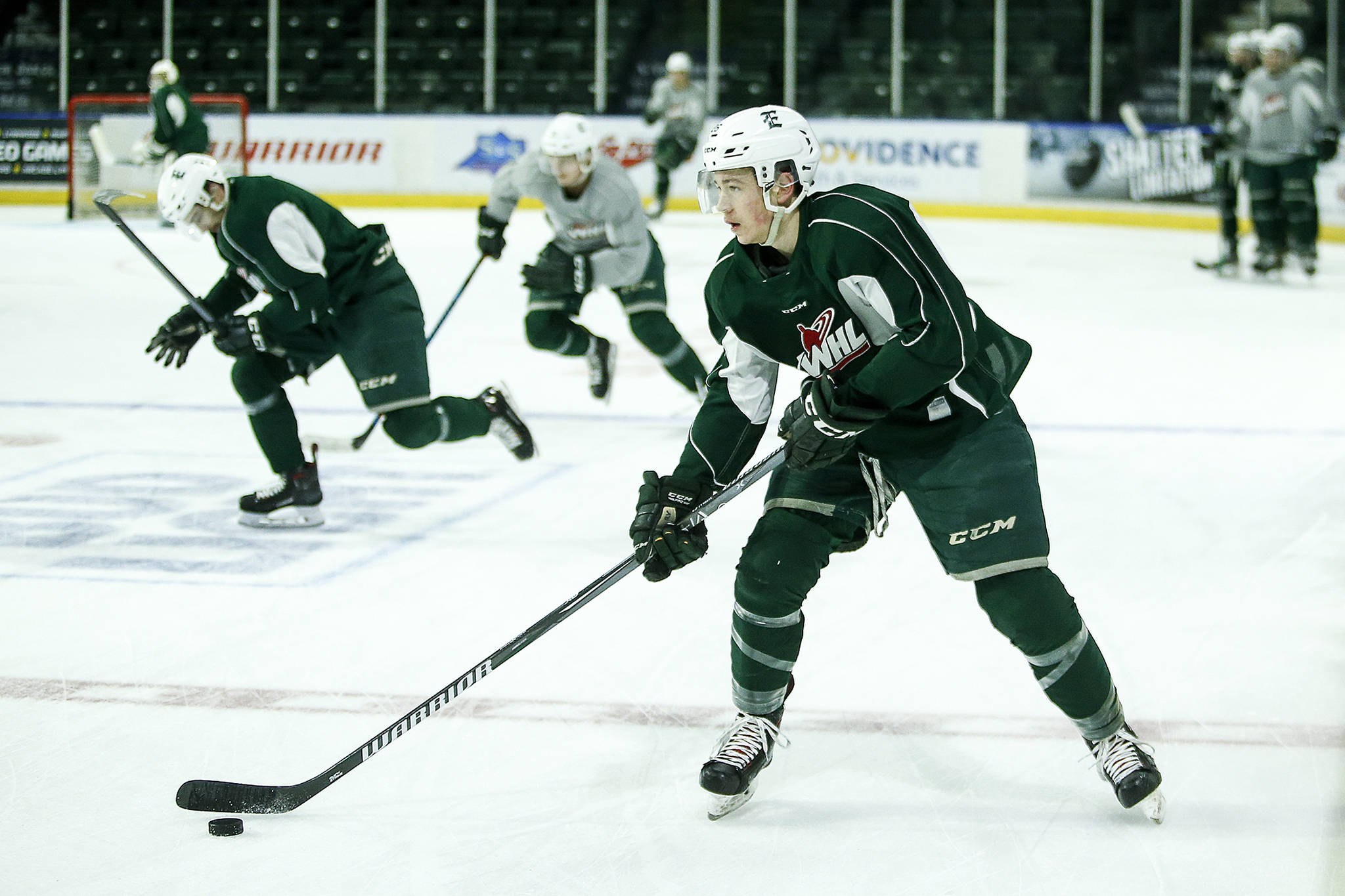 Silvertips center Reece Vitelli skates with the puck during a team practice on April 4, 2018, at Angel of the Winds Arena in Everett. (Ian Terry / The Herald)