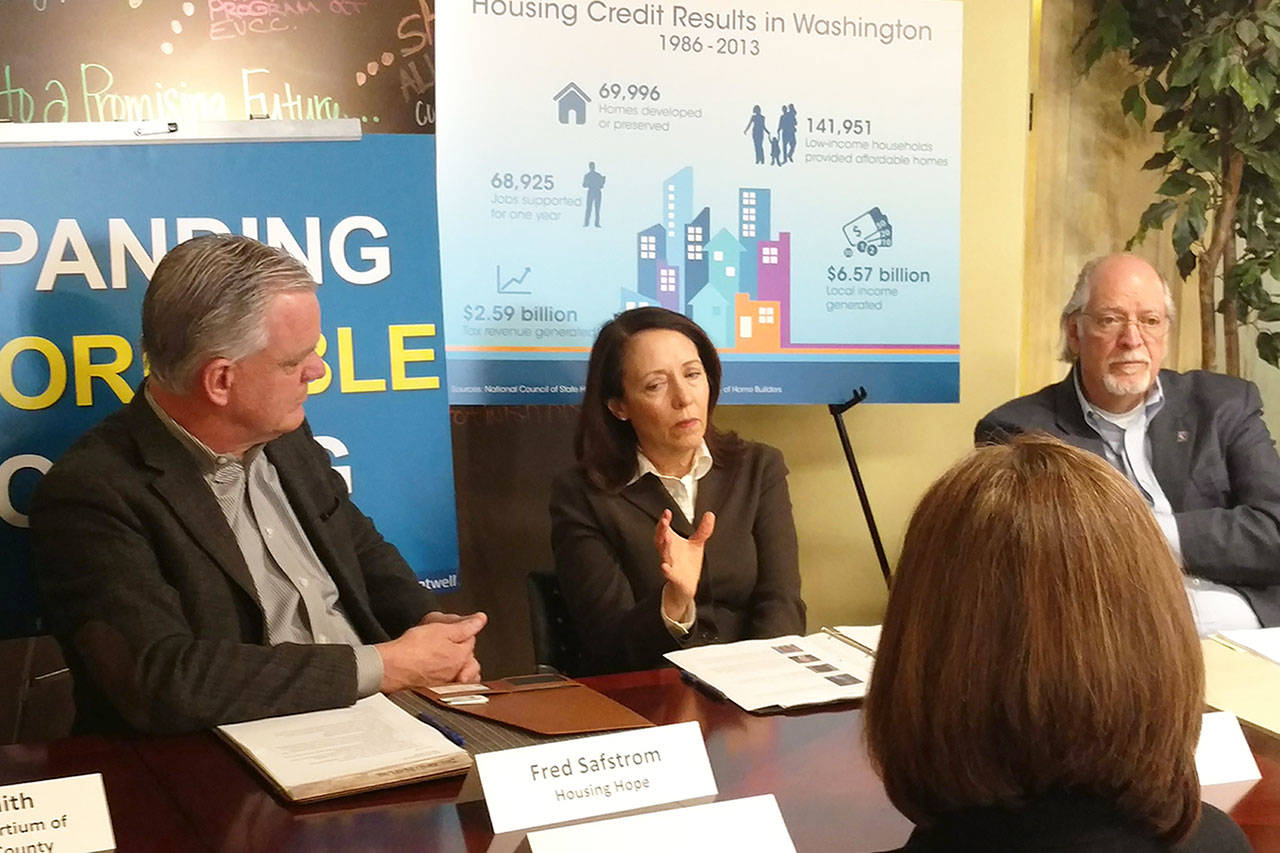 U.S. Sen. Maria Cantwell (center) meets with affordable housing advocates at HopeWorks Station in Everett on Friday, April 6, 2018. (Kari Bray / The Herald)