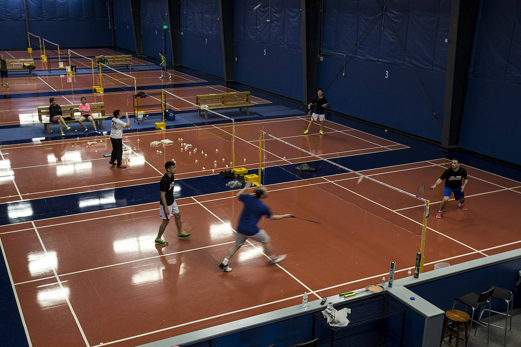Games take place on various courts at Harbour Pointe Badminton Club in Mukilteo on Saturday, April 8. Adult Nationals will be hosted there from April 13-15. (Ian Terry / The Herald)