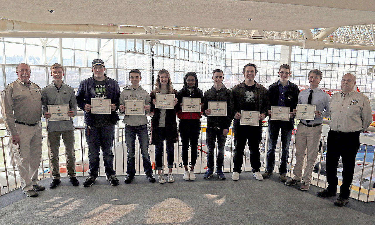 Pictured are all of the Cascade Warbirds 2018 Scholarship winners with their award certificates overlooking the Grand Gallery at the Museum of Flight in Seattle. Local winners were Jake Anderson (third from left), Mackenzie Rennhack (fifth from left) and Conner Spurling (third from right). (Contributed photo by Dan Shoemaker)