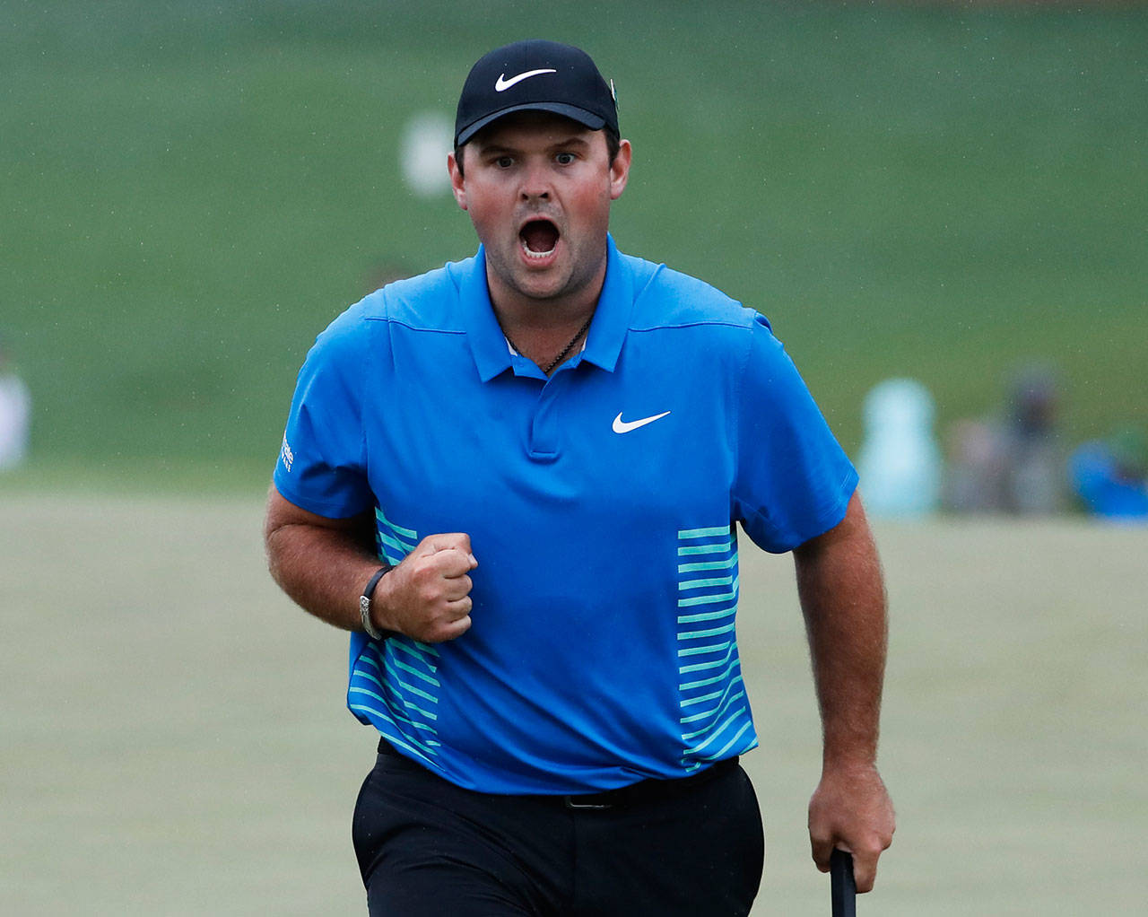 Patrick Reed reacts after making a birdie putt on the ninth hole during the third round of the Masters on April 7, 2018, in Augusta, Ga. (AP Photo/David Goldman)