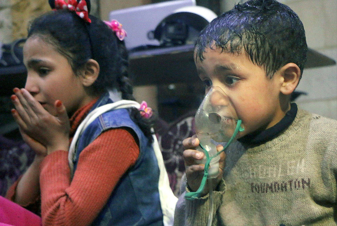 A child receives oxygen through respirators following an alleged poison gas attack in the rebel-held town of Douma, near Damascus, Syria. (Syrian Civil Defense White Helmets via AP)