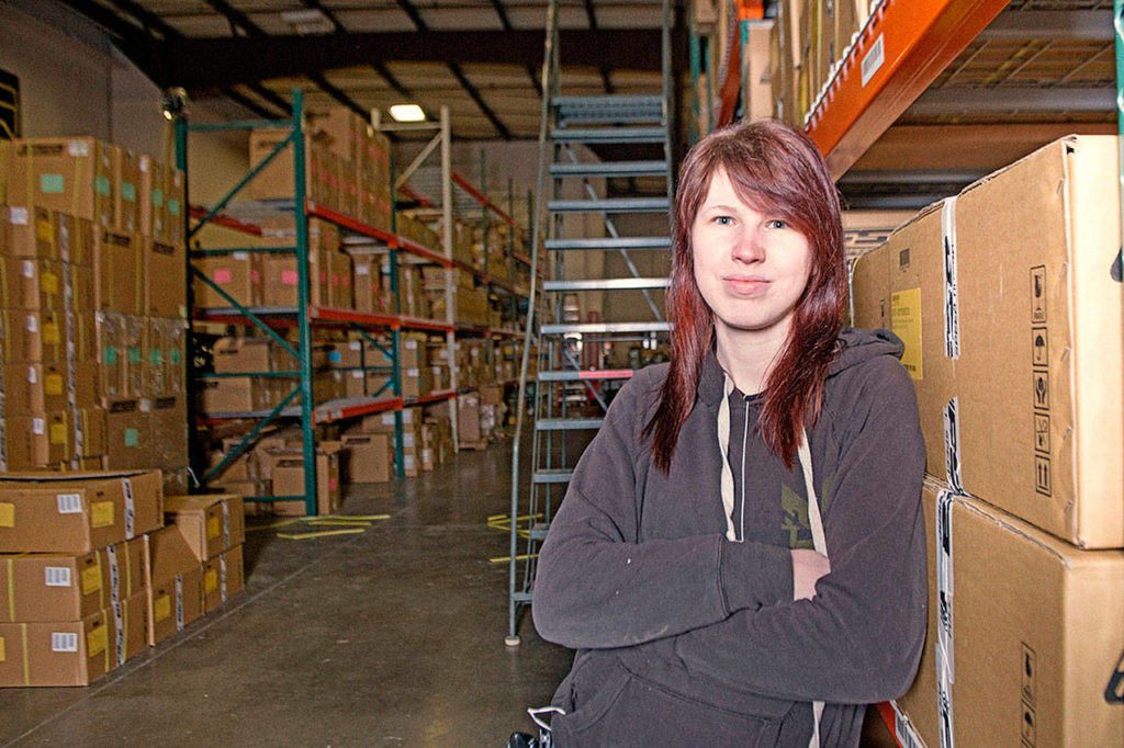 Ashley Underhill says she is the only woman working in her warehouse. “They treat me like one of the guys,” she says. “If you can dish out what they serve you, then you’re good.” (Photo by Tina Tang)
