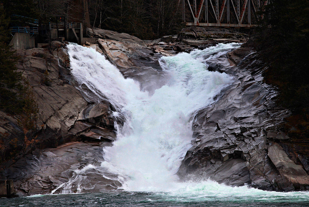 Sunset Falls cascades down along the South Fork of the Skykomish River, east of Index, in February 2014. The Snohomish PUD says it has now decided against construction of a hydropower project at the falls. (Mark Mulligan/Herald file photo)
