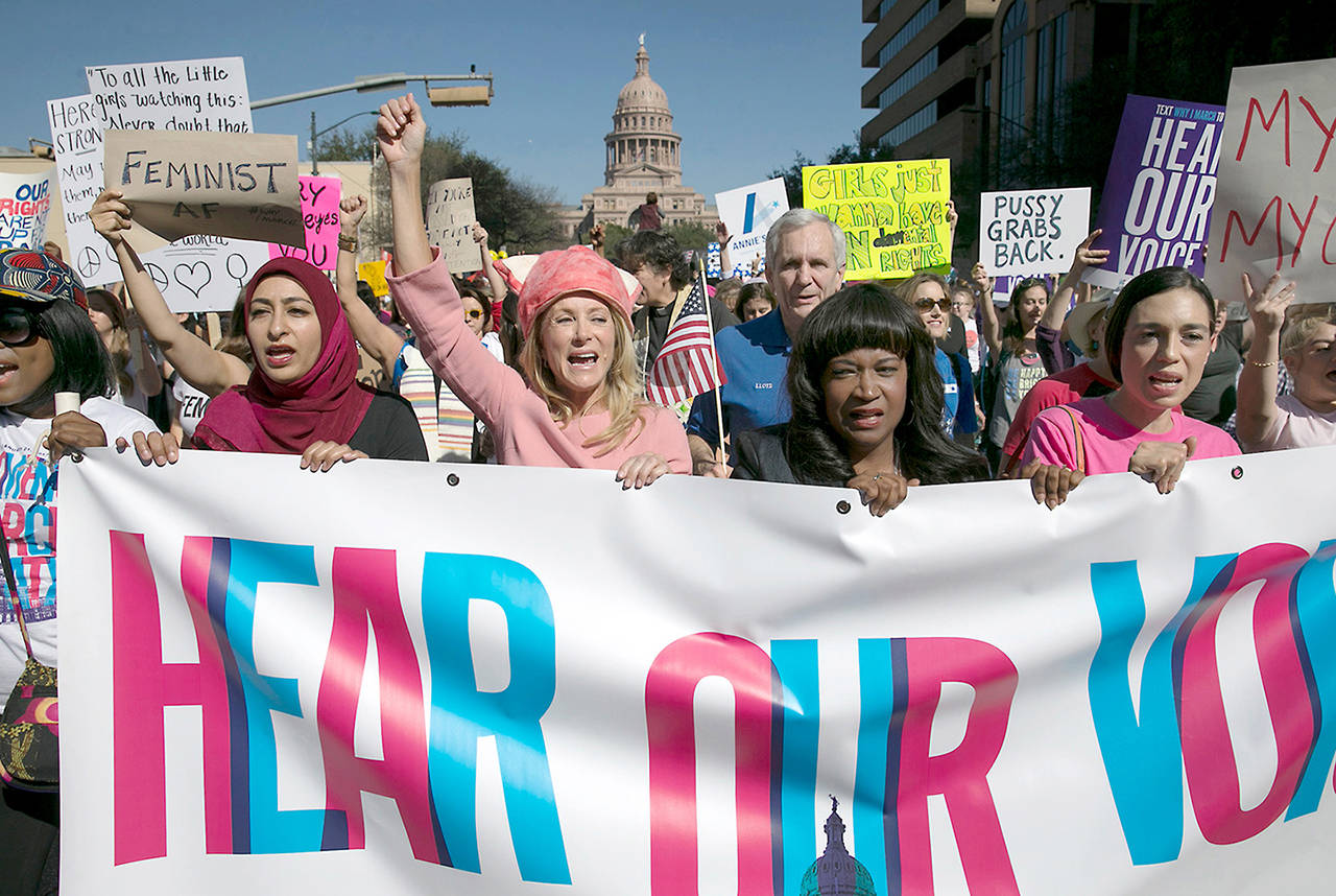 In this 2017 photo, former Texas State Sen. Wendy Davis (center), dressed in all pink, leads the Women’s March in Austin, Texas. (Ralph Barrera/Austin American-Statesman via AP)