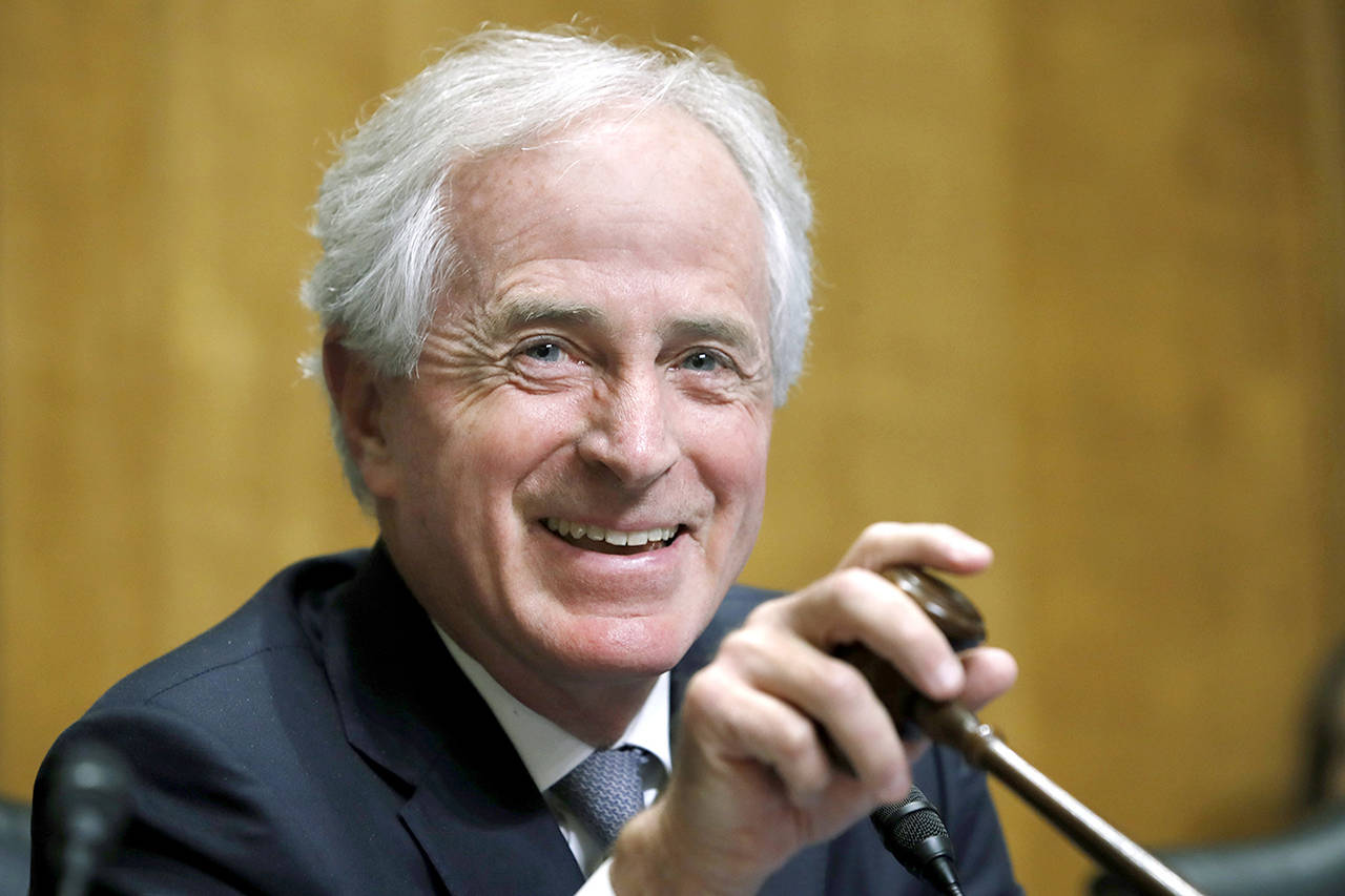 Senate Foreign Relations Committee Chairman Sen. Bob Corker, R-Tenn., laughs at the end of round one of questioning of Secretary of State-designate Mike Pompeo during a confirmation hearing on Pompeo’s nomination on Thursday on Capitol Hill in Washington. (AP Photo/Jacquelyn Martin)