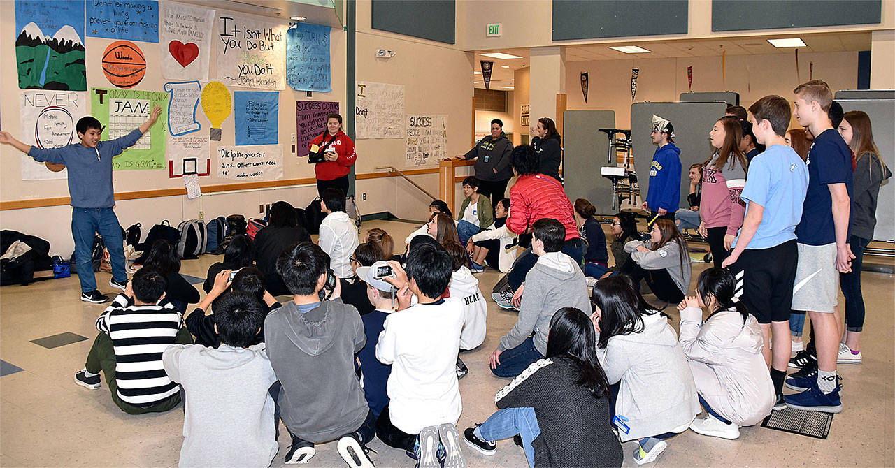 Nineteen Japanese teenagers visited Arlington for 10 days to experience how students learn in America. Here they attend classes with Haller Middle School students. (Contributed photo)