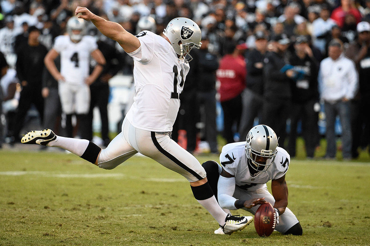 New Seahawks kicker Sebastian Janikowski kicks a field goal as a member of the Oakland Raiders during the second half of an NFL game against the San Diego Chargers on Sunday, Dec. 18, 2016, in San Diego. (Denis Poroy / AP Photo)