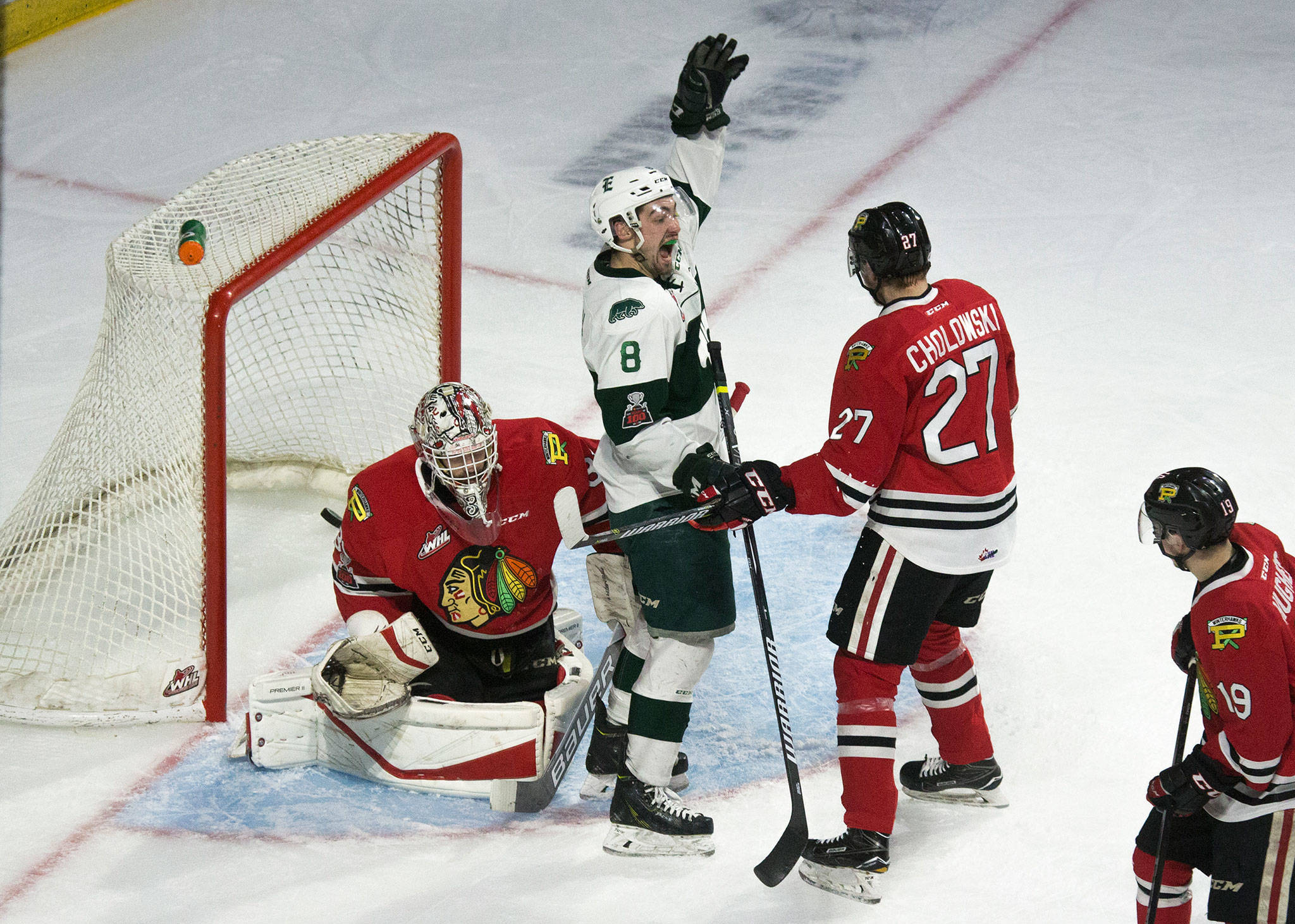 The Silvertips’ Patrick Bajkov (8) celebrates a goal by teammate Jake Christiansen (not pictured) during a playoff game against the Winterhawks on April 13, 2018, at Angel of the Winds Arena in Everett. (Andy Bronson / The Herald)