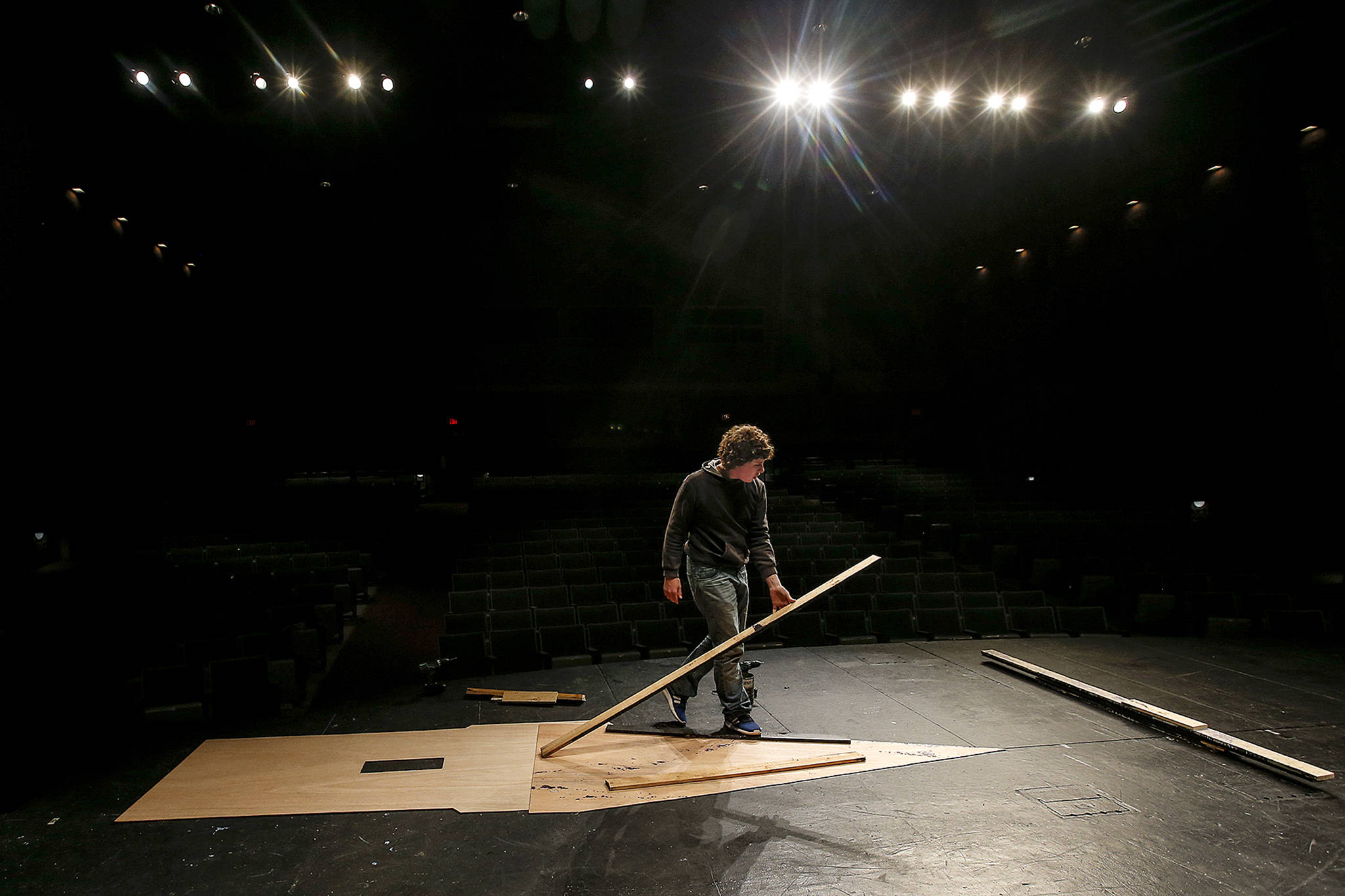 The framework for a castle tower is laid out by a student preparing props for Kamiak High School’s production of “Spamalot” on April 4. (Ian Terry / The Herald)