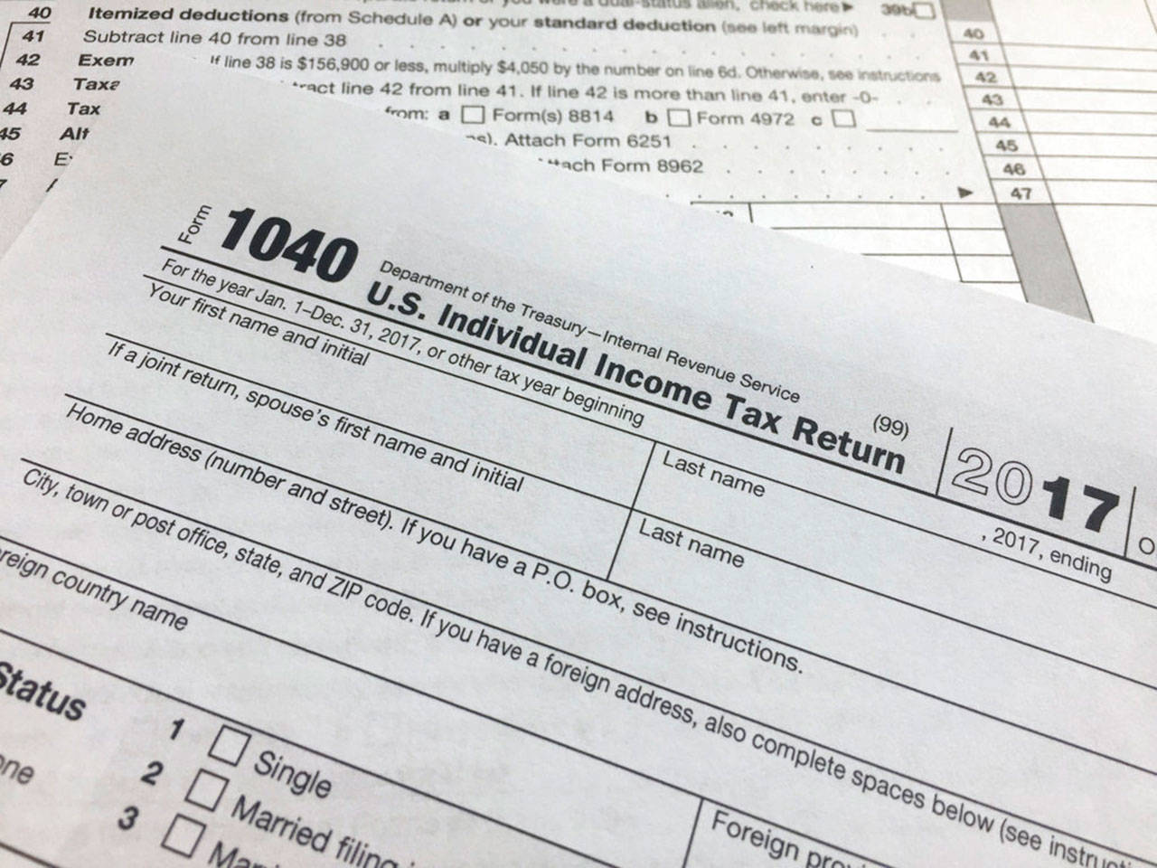 An IRS 1040 form, U.S. Individual Income Tax Return for 2017. (Associated Press)