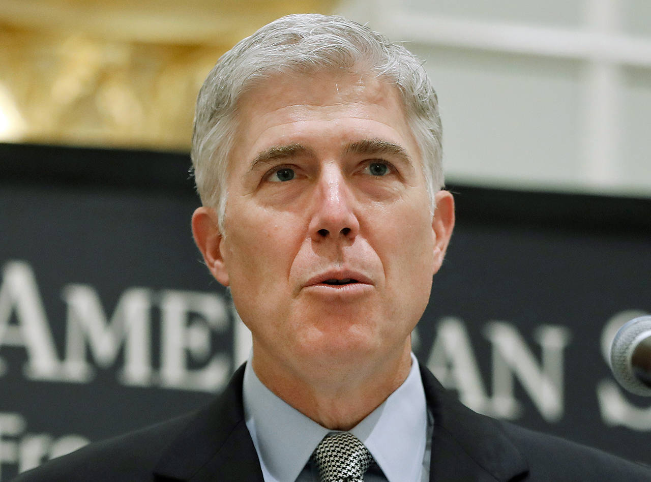 Supreme Court Justice Neil Gorsuch joined the courts four liberals in the 5-4 decision in deciding that part of a federal law making it easier to deport immigrants is too vague to be enforced. (AP Photo/Pablo Martinez Monsivais, File)