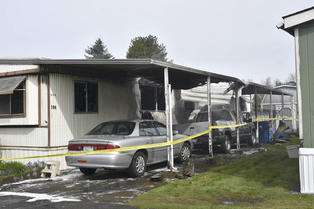An elderly man was killed after a mobile home fire Wednesday in Marysville. (Caleb Hutton / The Herald)
