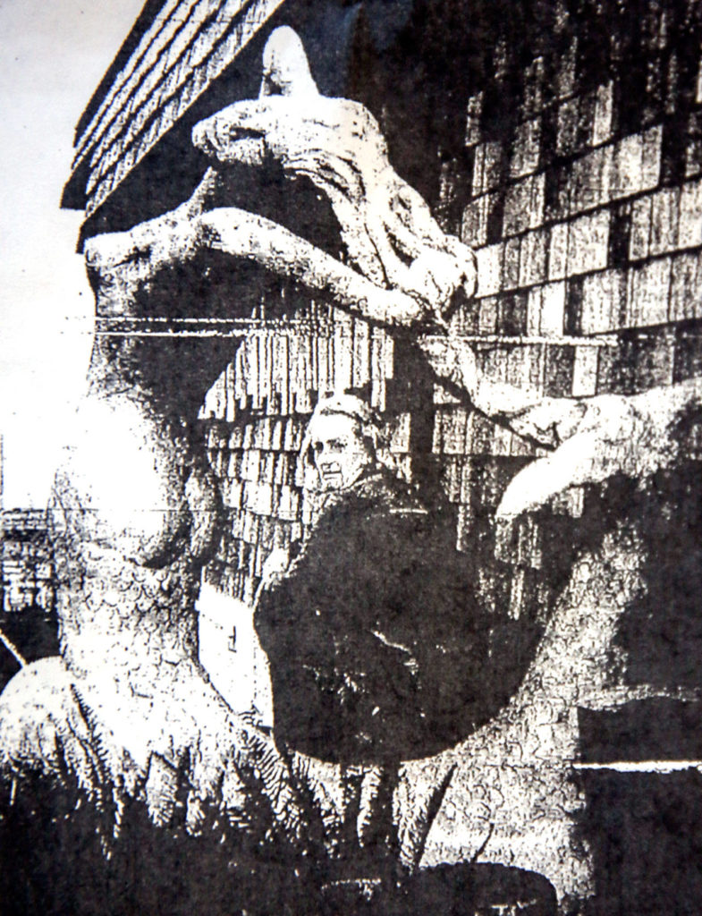 Kay Henkel, now 92, in a 1974 newspaper photo with the concrete mermaid she made in Mukilteo. (Kevin Clark / The Herald)
