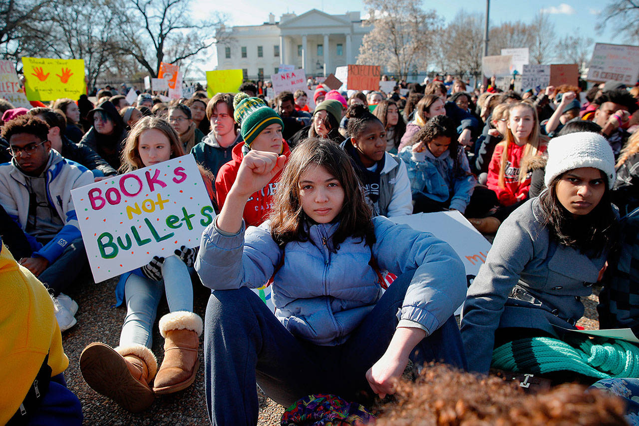 Young demonstrators hold a rally in front of the White House in Washington on March 14, 2018. (Carolyn Kaster / AP Photo)