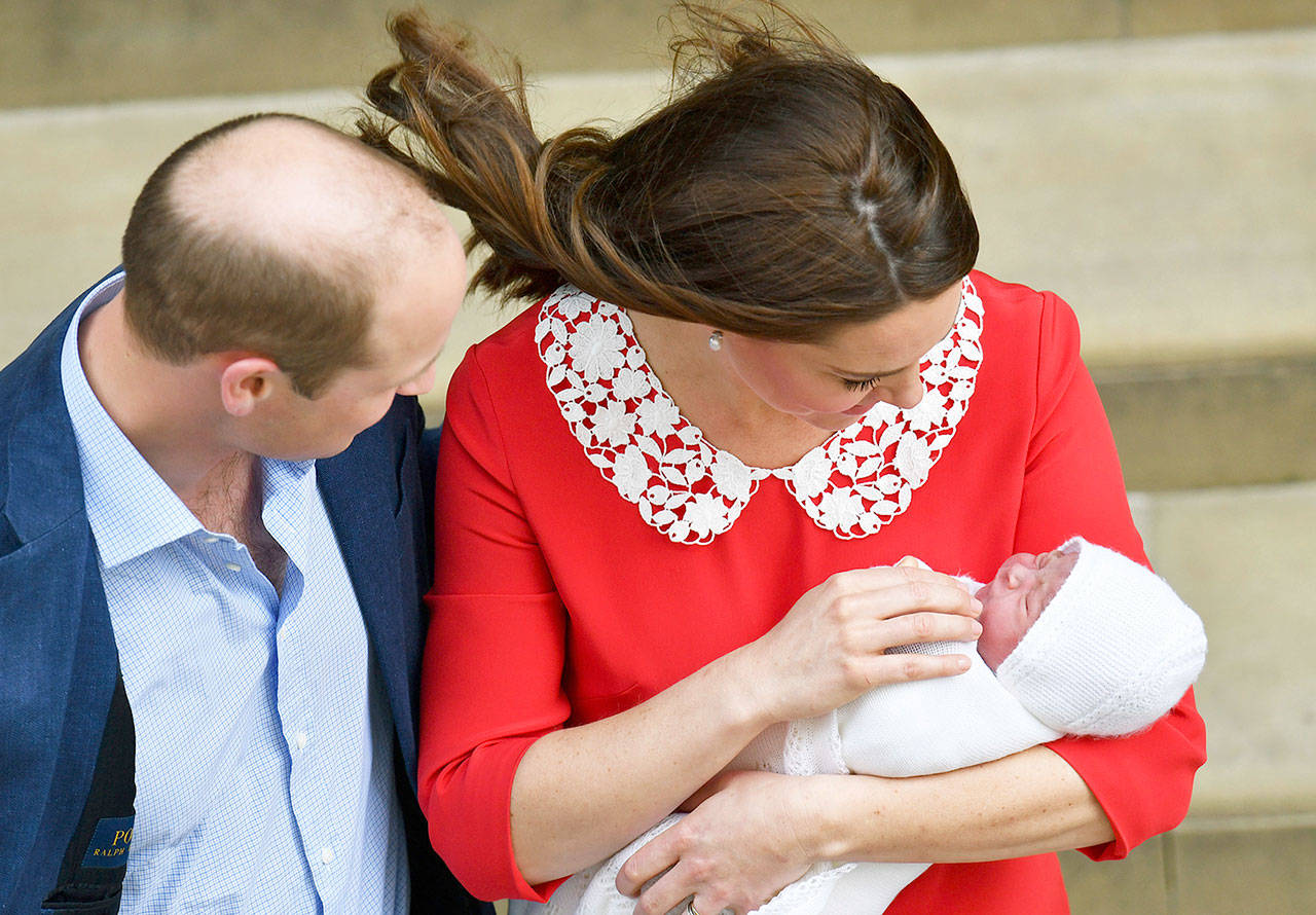 Britain’s Prince William and Kate, the Duchess of Cambridge, with their newborn baby son as they leave St Mary’s Hospital in London on Monday. (John Stillwell/Pool photo via AP)