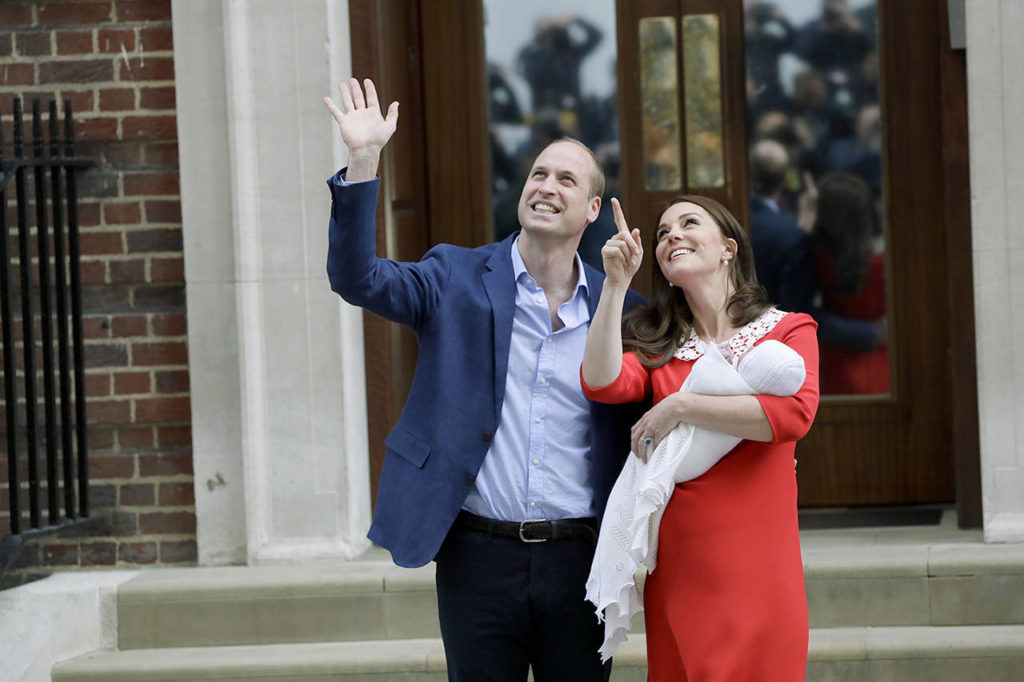 Britain’s Prince William and Kate, Duchess of Cambridge, pose for a photo with their newborn baby son. (AP Photo/Kirsty Wigglesworth) 
