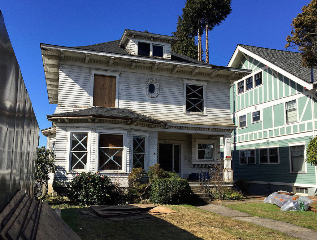 Builder Gary Nelson, co-owner and operator of Nelson Lumber Construction in La Conner, took on this restoration of a 1907 house at 2108 Rucker Ave. It’s looking much better now and its six apartments are filled with happy renters. (Contributed Photo)
