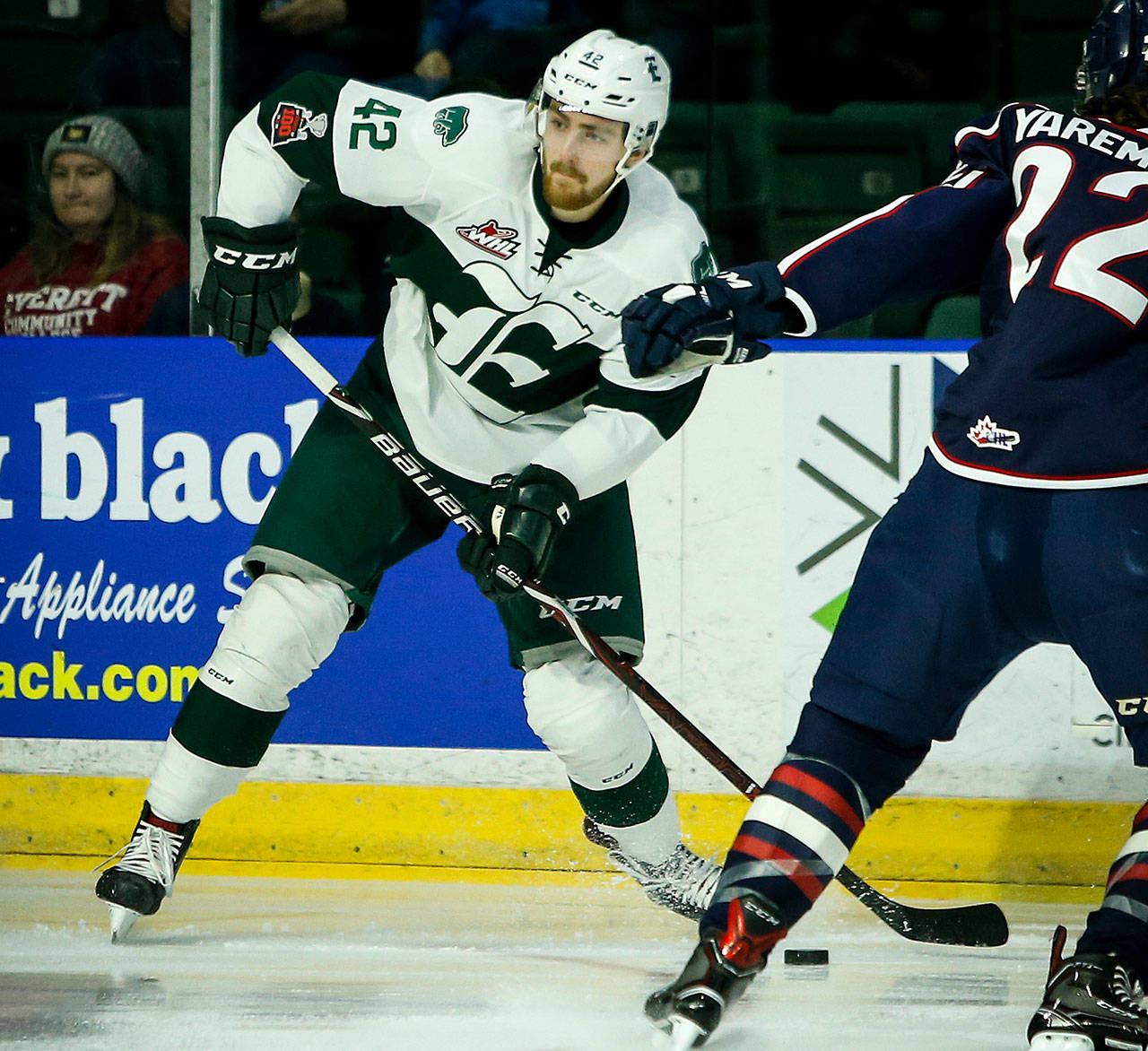 Everett’s Ondrej Vala passes the puck during a Jan. 10 game at Angels of the Winds Arena. (Ian Terry / The Herald)
