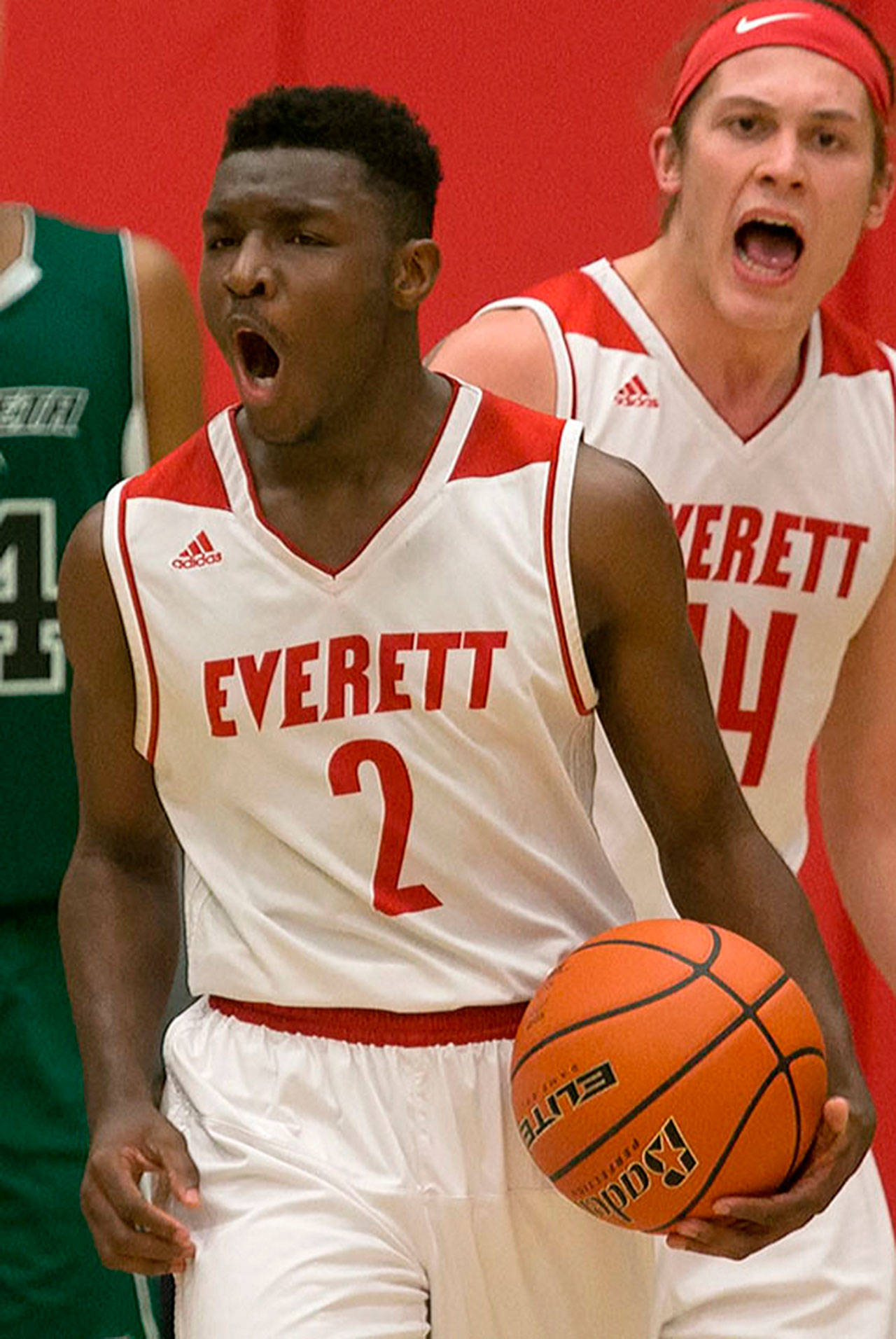 Everett’s Gio Jackson (2) celebrates drawing a foul in closing seconds of a game against Chemeketa during the NWAC Basketball Tournament at Everett Community College in March. (Kevin Clark / The Daily Herald)