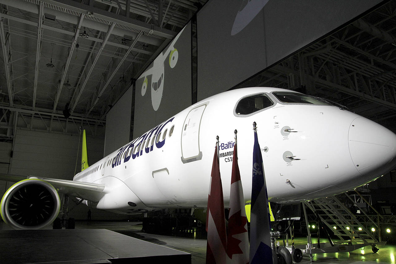 The Bombardier CS300 jet aircraft is displayed during a news conference in Mirabel, Quebec in 2016. (Valerian Mazataud/Bloomberg)