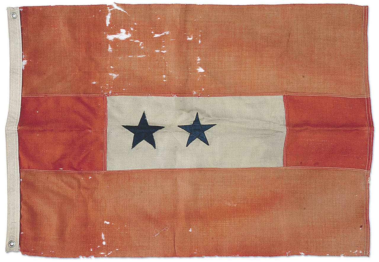 This Blue Star Mother’s 23- by 35-inch flag was offered for sale in a recent auction for $1,000 to $2,000, but didn’t sell. Such flags have been a tribute to those in the armed services since 1917. (Cowles Syndicate Inc.)