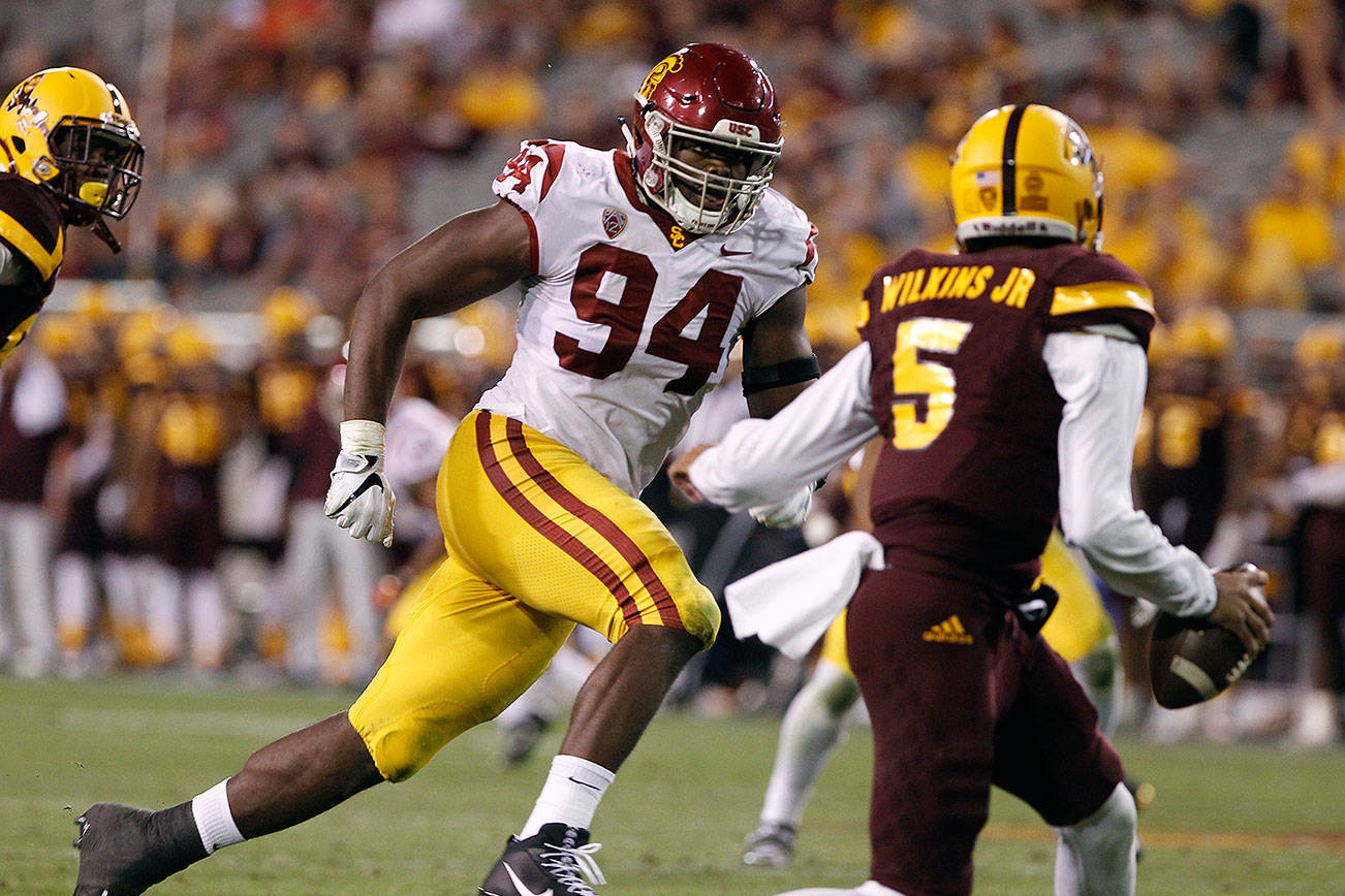 Seahawks trade back, draft USC defensive lineman in 3rd round