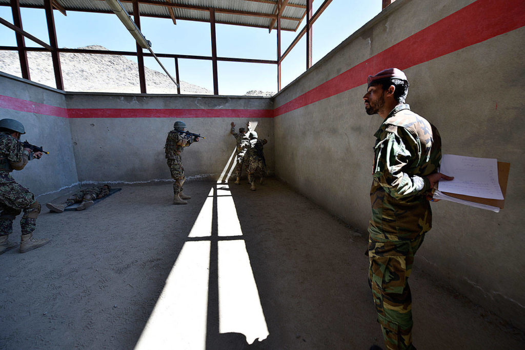 Prospective Afghan commandos carry out close-quarters battle training at Camp Commando, Afghanistan, on April 10. (Master Sgt. Felix Figueroa/ U.S. Army)
