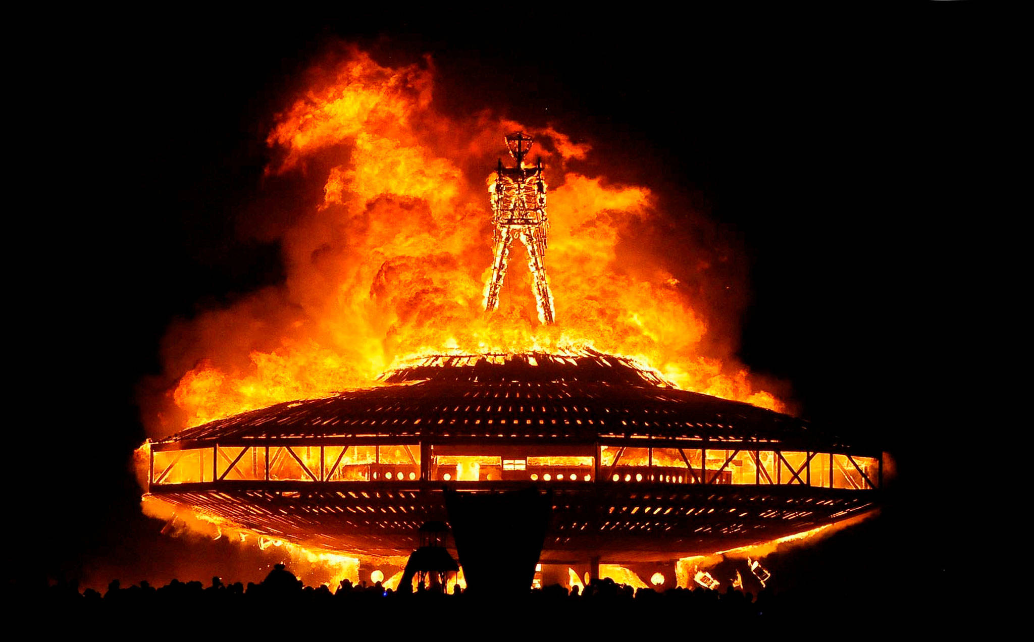 In this 2013 photo, the “Man” burns on the Black Rock Desert at Burning Man near Gerlach, Nevada. (Andy Barron /The Reno Gazette-Journal via AP, File)