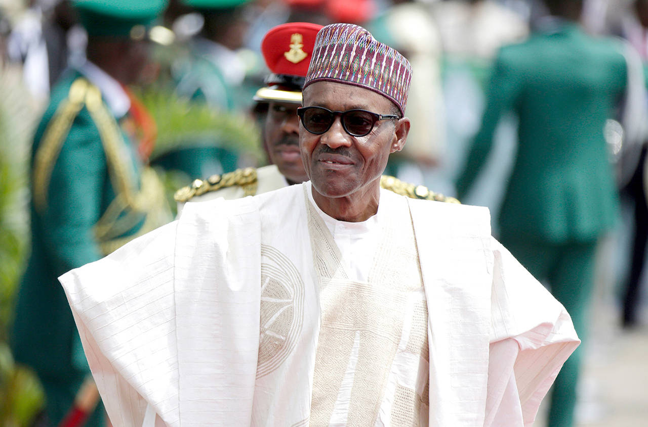In this 2015 photo, Nigerian President Muhammadu Buhari arrives for his Inauguration at the eagle square in Abuja, Nigeria. (AP Photo/Sunday Alamba, File)