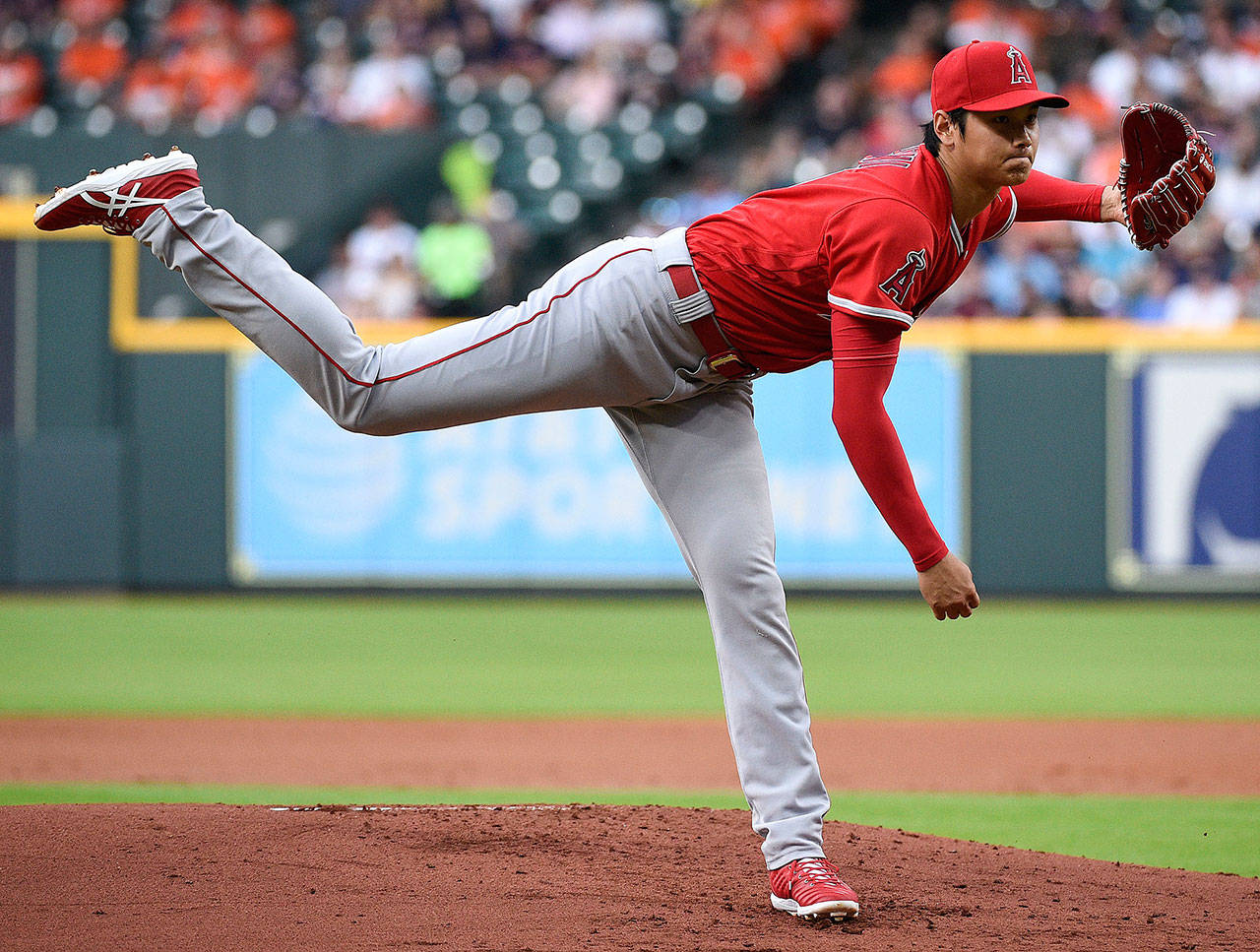 Los Angeles Angels starter Shohei Ohtani follows on a pitch during the first inning of the team’s baseball game against the Houston Astros, Tuesday, April 24, 2018, in Houston. (Eric Christian Smith / Associated Press)