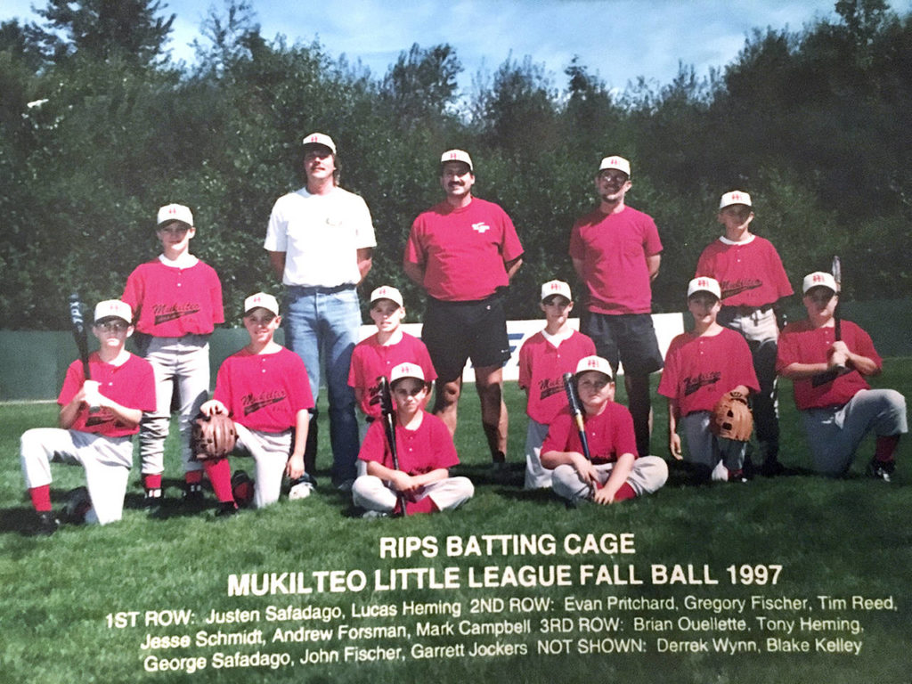 Brian Ouellette, at age 11, stands in the back row of a Mukilteo Little League team photo in fall 1997. Two spots to the right is coach George Safadago. Twenty-one years later, Ouellette would be a lead paramedic who helped save Safadago’s life when he suffered a cardiac arrest. (Brian Ouellette)
