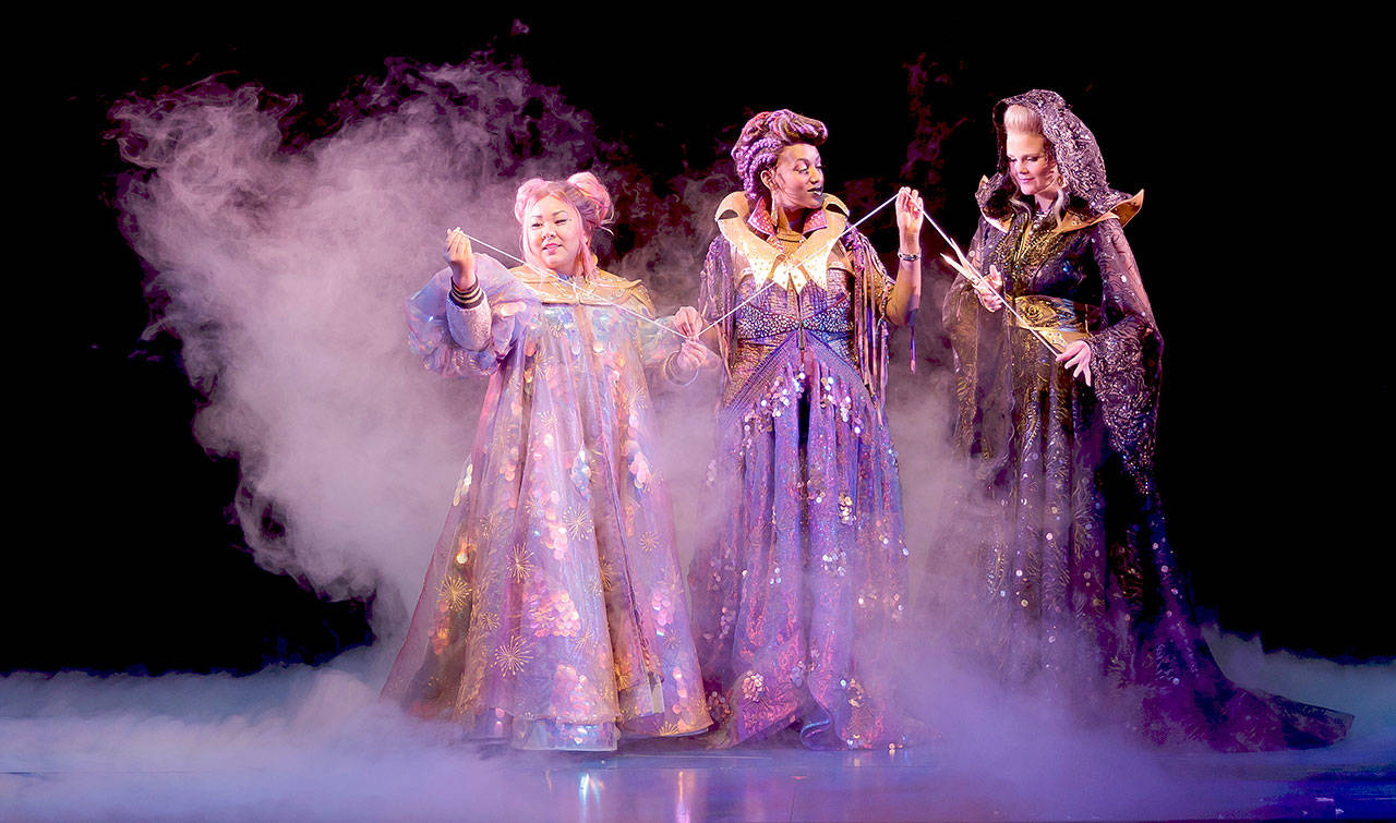 From left, Sara Porkalob (Clotho), Lauren Du Pree (Lachesis) and Jessica Skerritt (Atropos) play The Fates of Greek mythology in Village Theatre’s production of “String,” through May 20 at the Everett Performing Arts Center. (Photo by Mark Kitaoka)