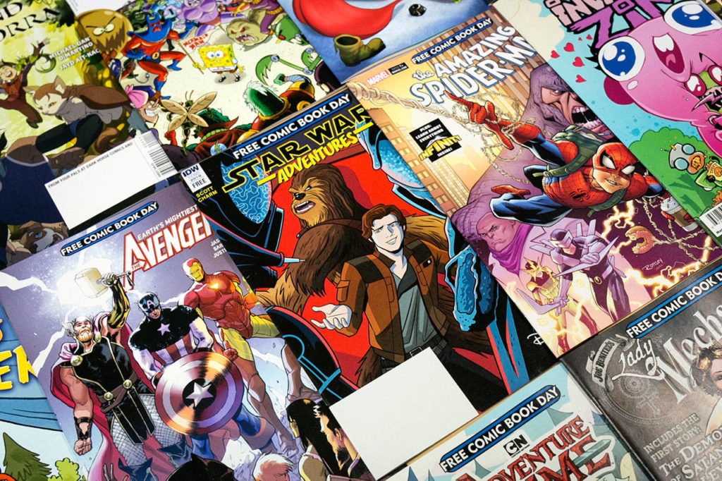 A few samples of the free comics available at Everett Comics on Free Comic Book Day are shown. (Kevin Clark / The Herald)

