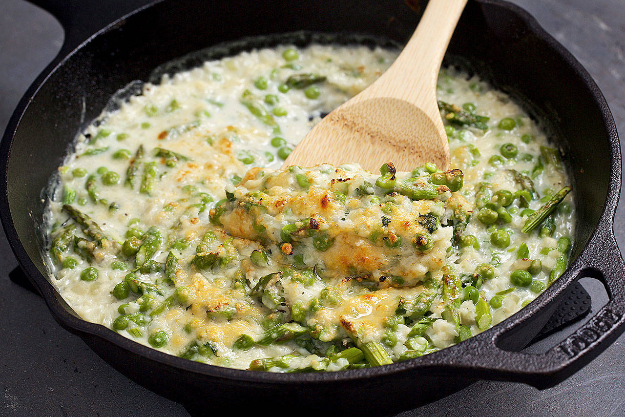 Creamy Parmesan spring vegetable skillet is made with melted Parmigiano-Reggiano cheese. (Photo by Deb Lindsey for The Washington Post)