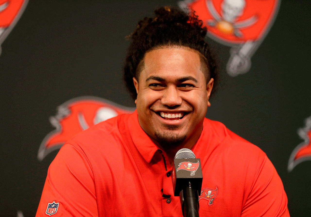 Buccaneers first-round draft pick Vita Vea meets the media during a news conference on April 27, 2018, in Tampa, Fla. Vea, a defensive lineman, played his college football at Washington. (AP Photo/Chris O’Meara)
