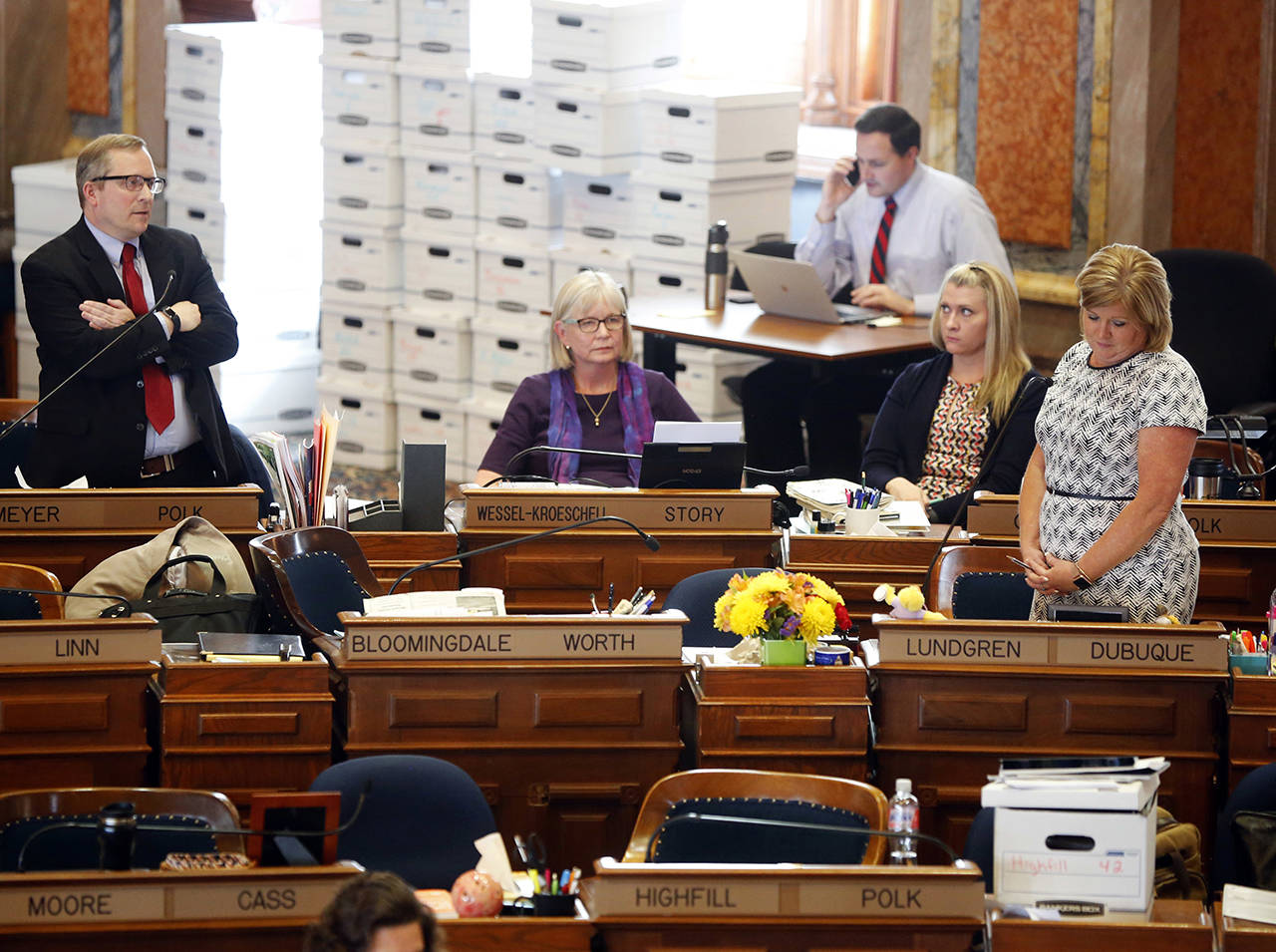 Rep. Brian Meyer of Polk County questions Representative Shannon Lundgren of Dubuque on the floor of the Iowa House as legislators debate the “heartbeat” bill at the state capitol in Des Moines. (Zach Boyden-Holmes/The Des Moines Register)