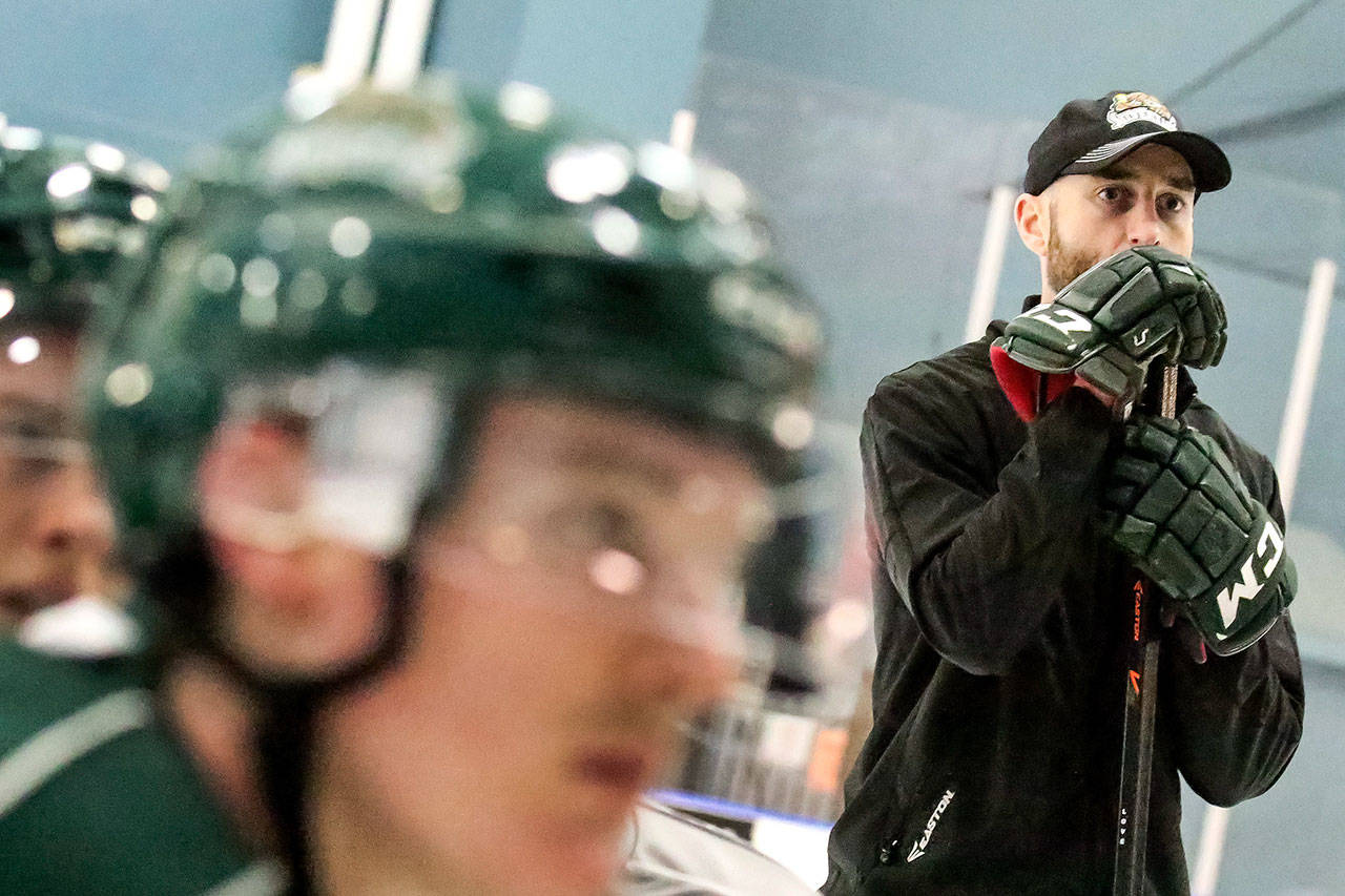 Mitch Love watches during Everett Silvertips practice Nov. 24, 2015. (Kevin Clark / The Herald)