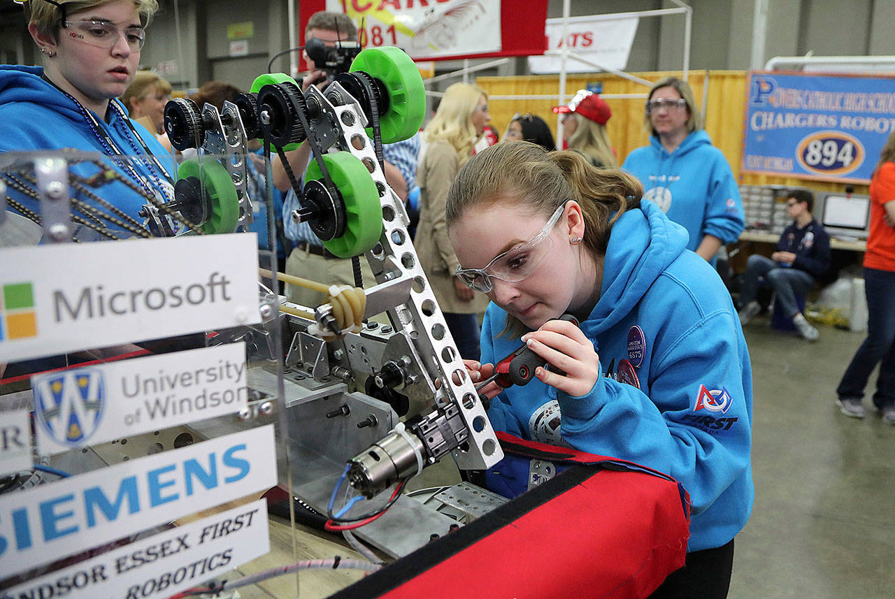 Valerie Alexander works on the team’s robot at the FIRST Championship in Detroit on April 26. (AP Photo/Carlos Osorio)