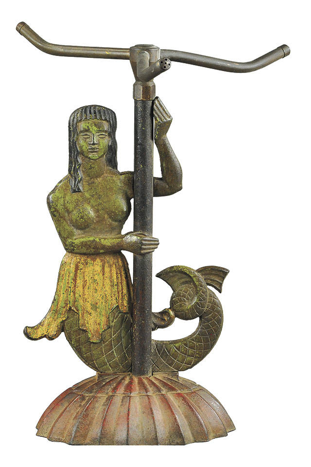 Underground sprinkler systems have replaced the need for a sprinkler attached to a hose in many yards, but the antique figural mermaid sprinkler still is a popular but scarce collectible often considered folk art. It took $2,040 to buy this painted sprinkler at an auction. (Cowles Syndicate Inc.)