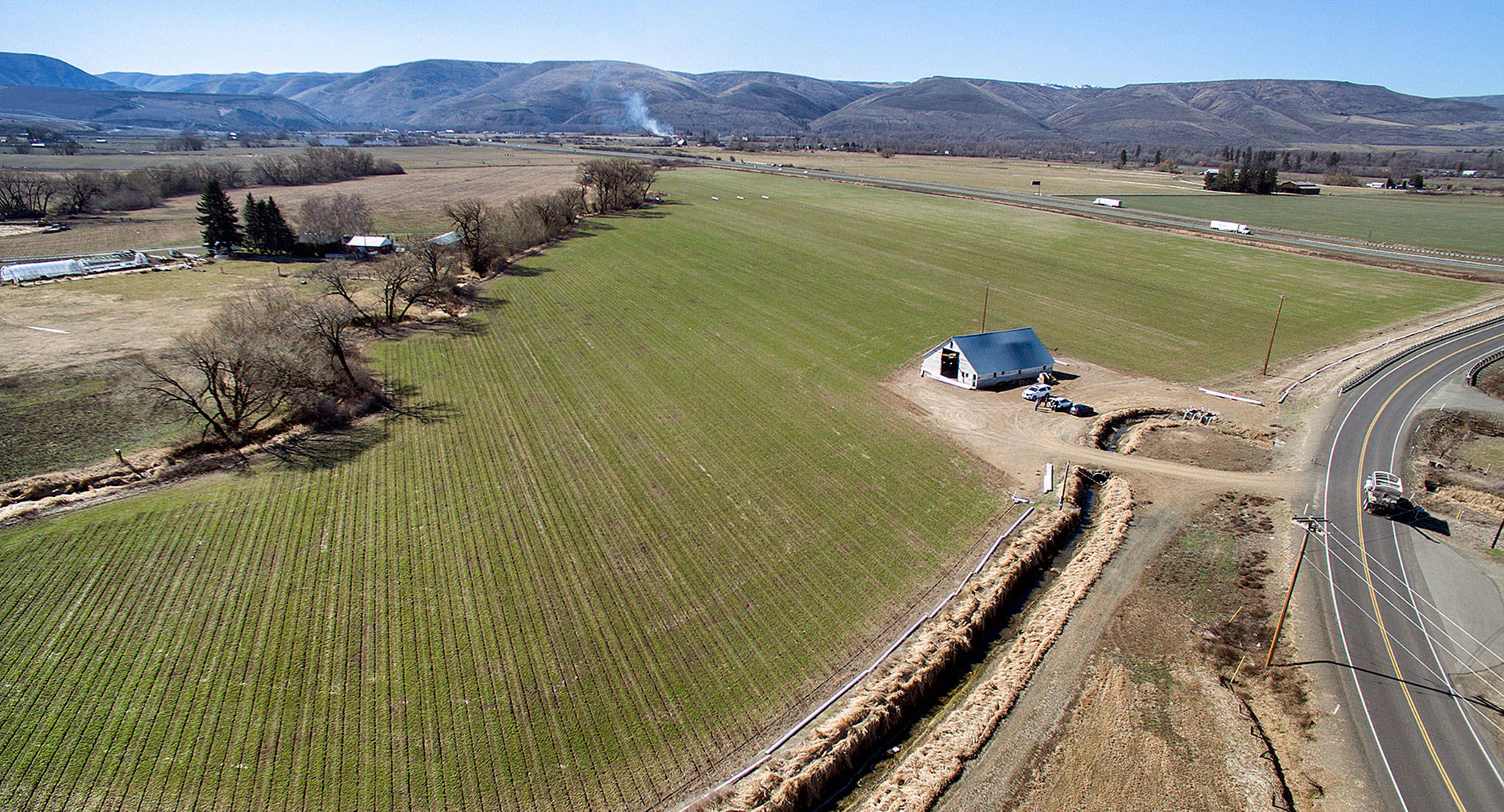 Jeff and Jackie Brunson’s land near Ellensburg. The couple, who farm about 1,000 acres, plan to lease out more than 80 for a solar farm. (Steve Ringman /The Seattle Times via AP)