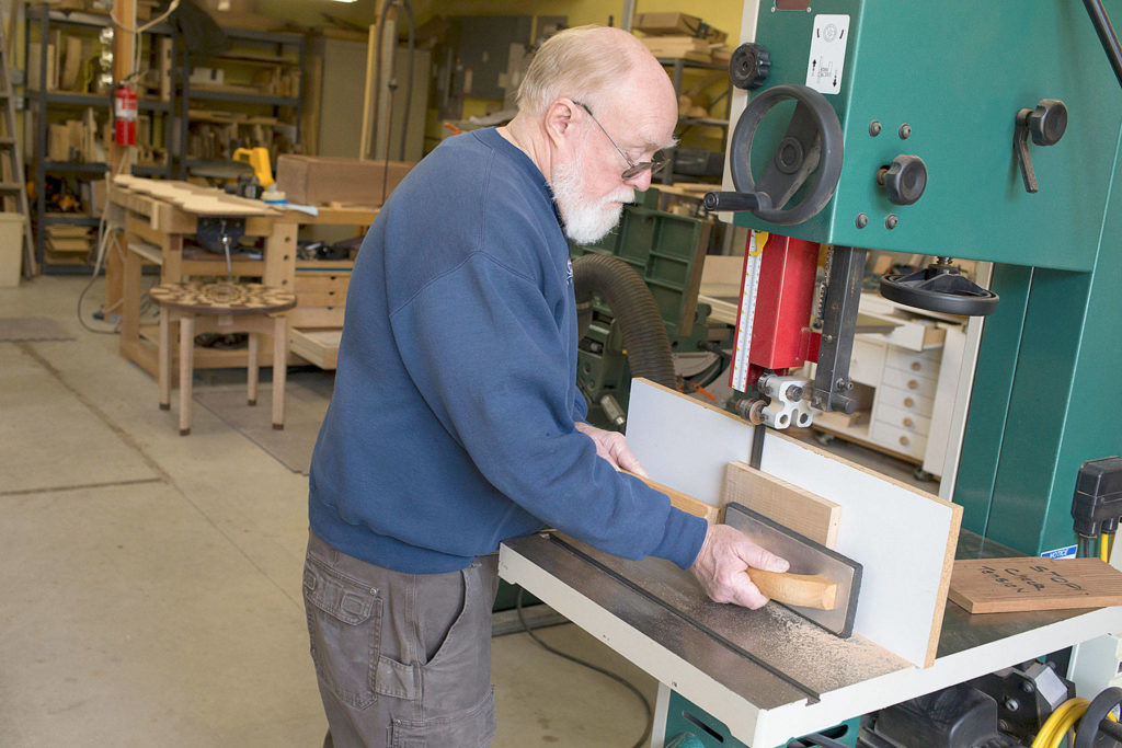 Woodworker Russ Riddle in his shop on Camano Island. He will be featured on the Camano Island Studio Tour, which kicks off Friday. (Andy Bronson / The Herald)
