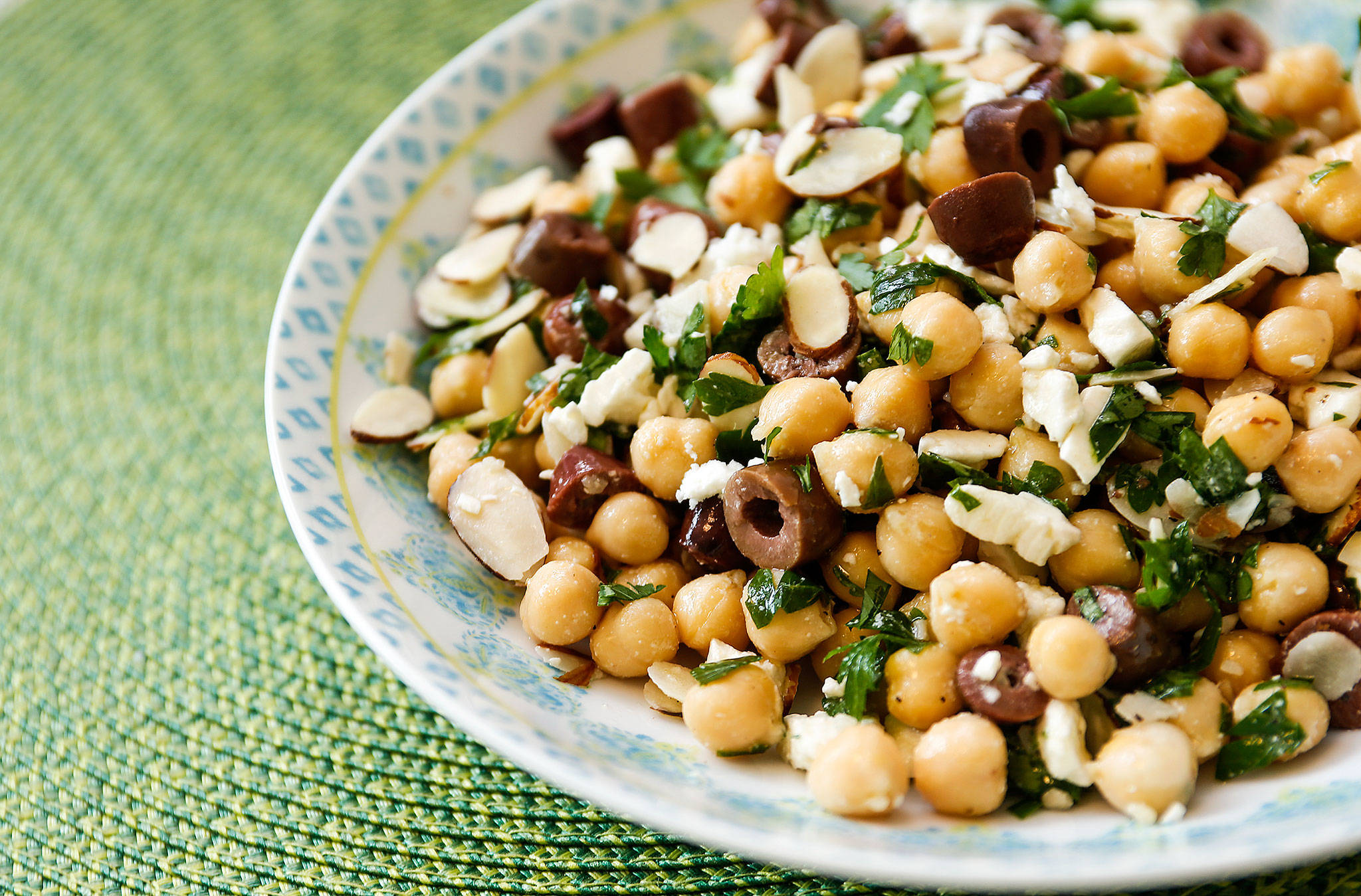 Mediterranean chickpea salad is classy way to eat one of the world’s pantry staples. (Andy Bronson / The Herald)